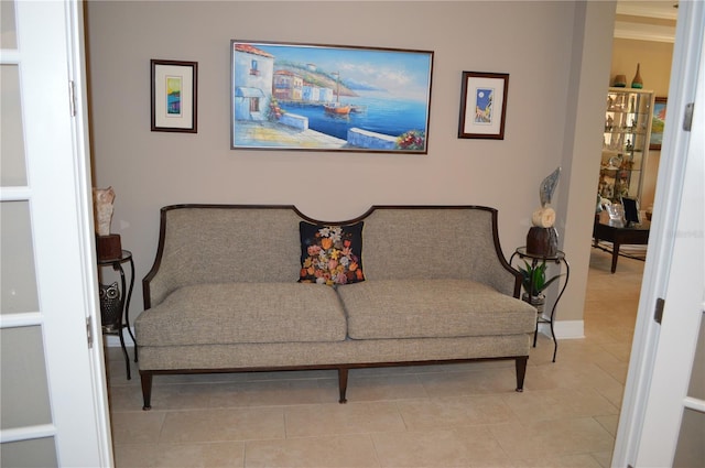 living room with light tile patterned floors