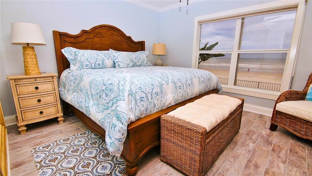 bedroom with crown molding