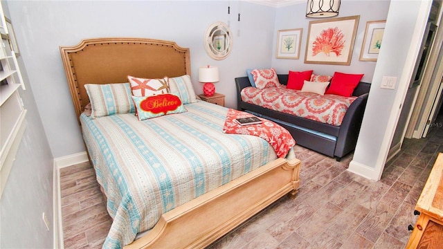 bedroom featuring hardwood / wood-style floors