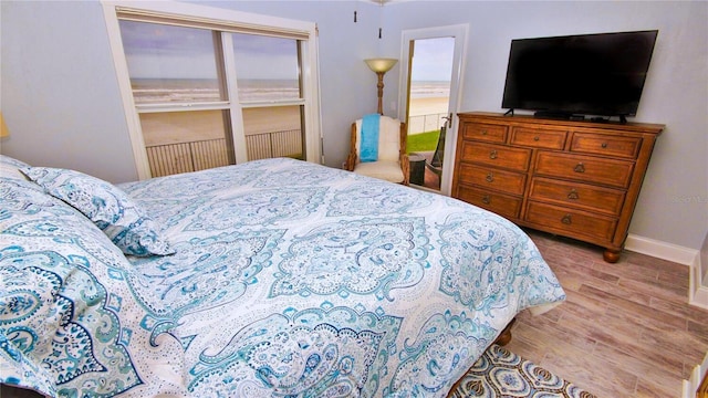 bedroom featuring light wood-type flooring