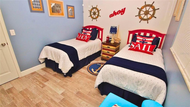 bedroom featuring light wood-type flooring