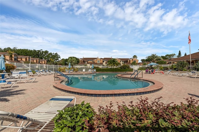 view of pool featuring a patio area