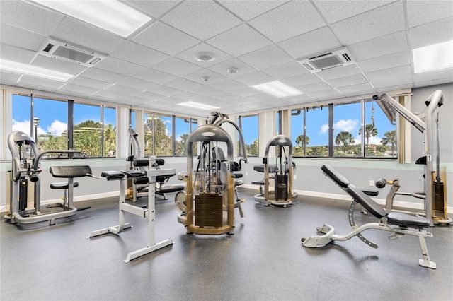 workout area with a drop ceiling