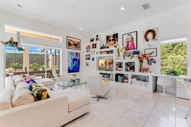 living room with light tile patterned floors