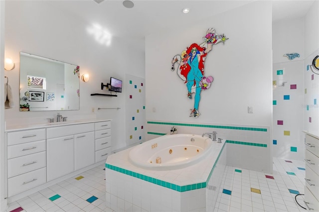 bathroom with tile patterned floors, separate shower and tub, and vanity