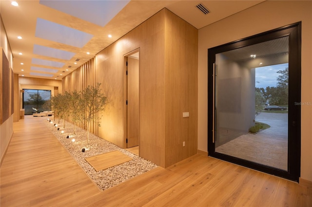 corridor featuring light hardwood / wood-style flooring