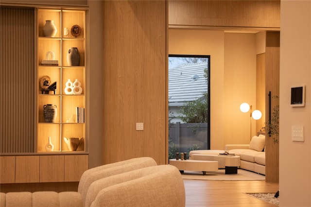 sitting room featuring wood-type flooring