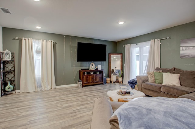 living room featuring light wood-type flooring