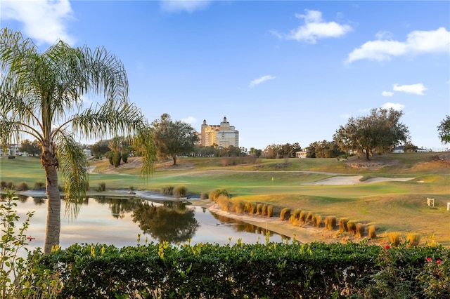 surrounding community featuring a water view