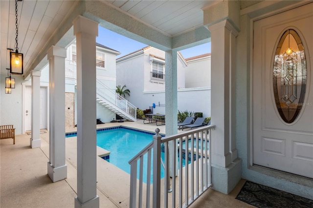 view of swimming pool featuring a patio