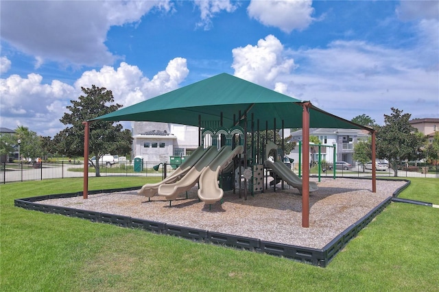 view of playground featuring a lawn