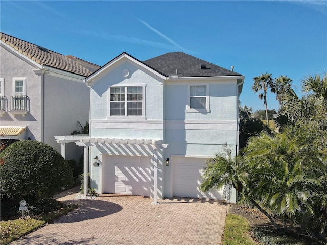 front of property featuring a garage