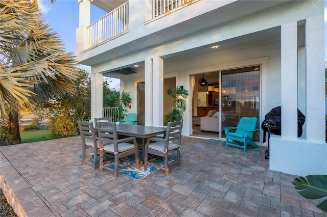 view of patio / terrace with a balcony