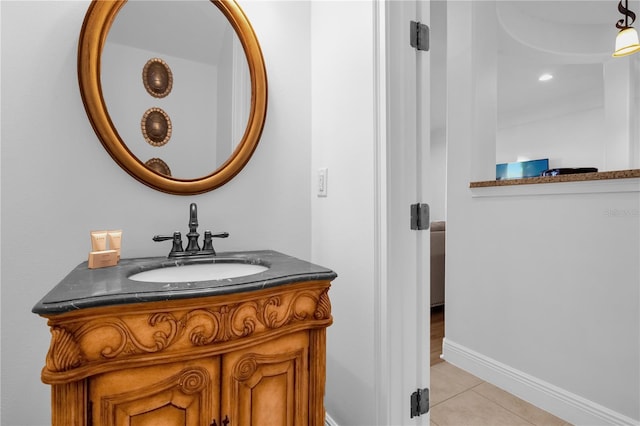 bathroom with vanity and tile patterned floors