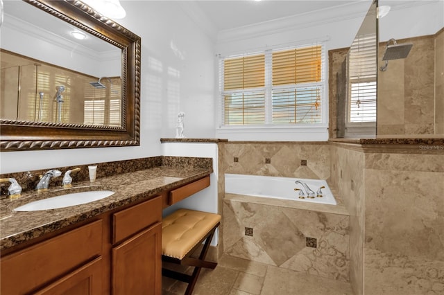 bathroom featuring crown molding, vanity, and separate shower and tub