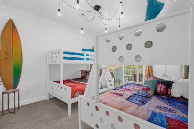 carpeted bedroom featuring crown molding