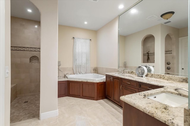 bathroom featuring vanity, tile patterned floors, and independent shower and bath