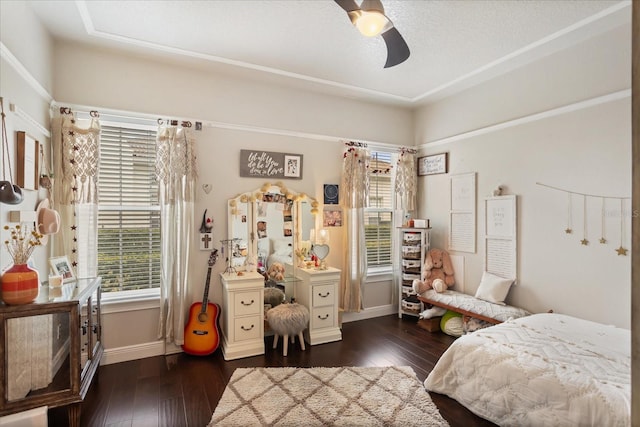 bedroom featuring ceiling fan and dark hardwood / wood-style floors