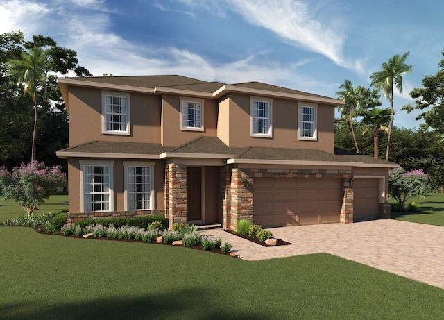 view of front facade with a garage and a front lawn