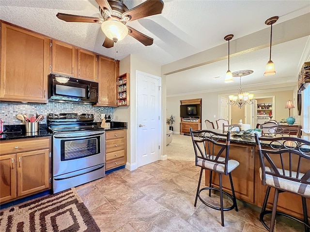 kitchen featuring tasteful backsplash, stainless steel electric range, a breakfast bar, hanging light fixtures, and ornamental molding