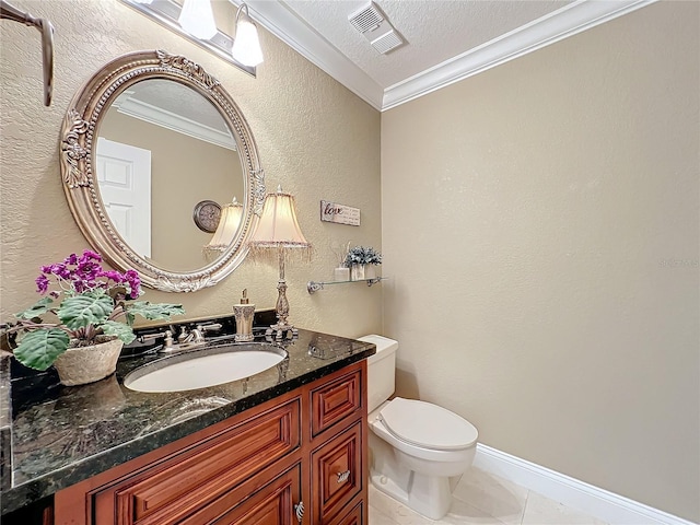 bathroom featuring toilet, vanity, tile patterned floors, crown molding, and a textured ceiling