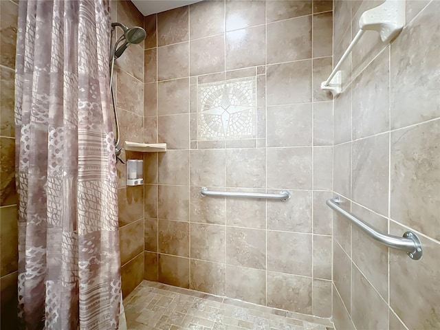 bathroom with a shower with curtain