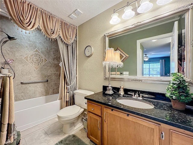 full bathroom featuring a textured ceiling, tile patterned floors, vanity, shower / bath combination with curtain, and toilet