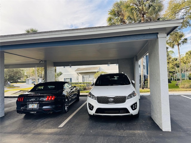 view of parking featuring a carport