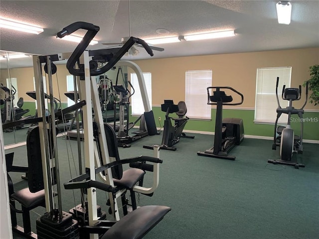 workout area with a textured ceiling