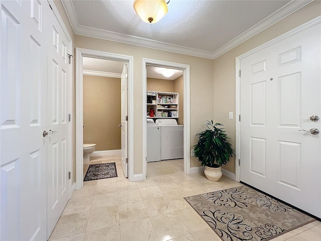 4208 Clubside Dr Unit 4208, Longwood, FL 32779 - entryway with independent washer and dryer, a textured ceiling, crown molding, and baseboards