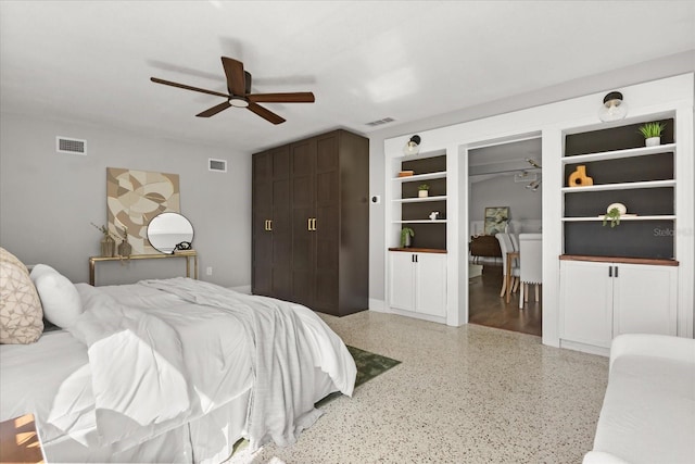 bedroom featuring speckle patterned floor and ceiling fan