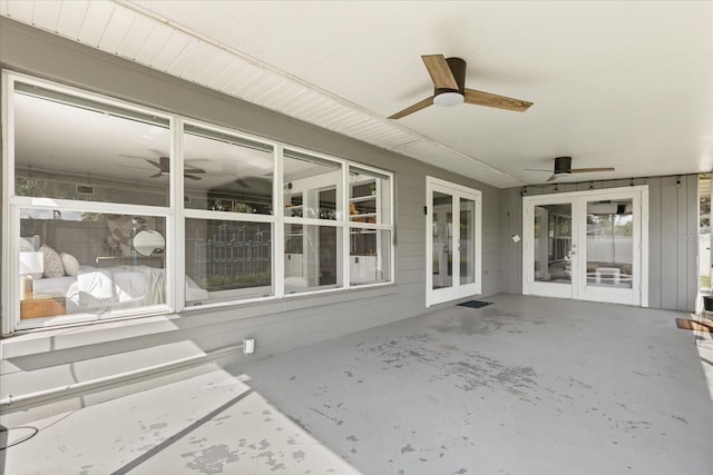 view of patio featuring french doors and a ceiling fan