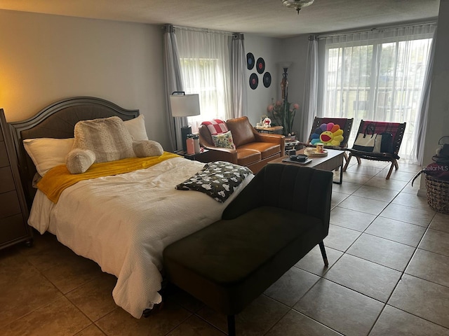 bedroom featuring tile patterned floors