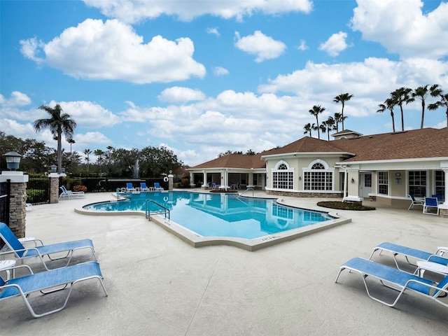 view of pool featuring a patio area