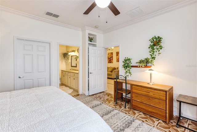 bedroom with ceiling fan, connected bathroom, and crown molding