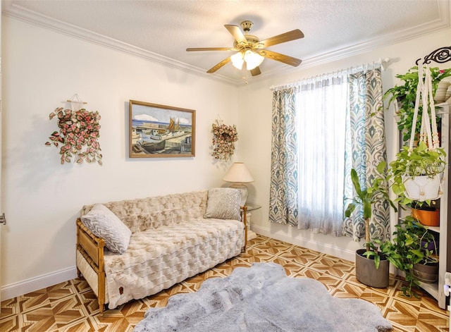 living area with a textured ceiling, a wealth of natural light, and crown molding