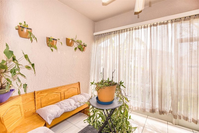 living area featuring light tile patterned floors