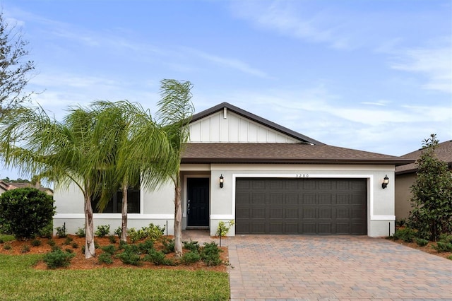 view of front of property featuring a garage