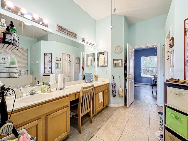 bathroom with vanity and tile patterned flooring