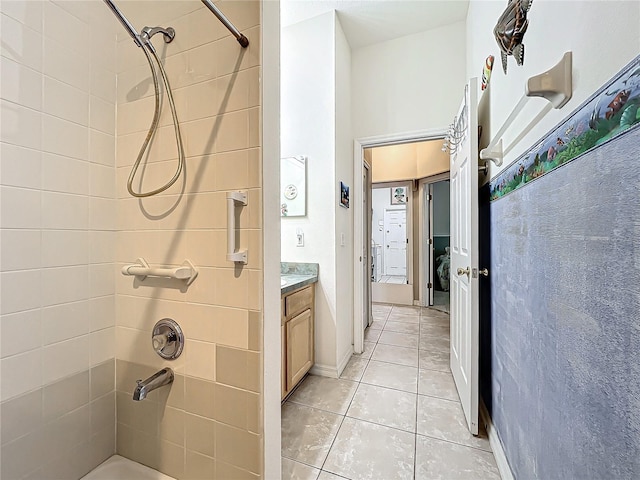 bathroom with vanity and tile patterned flooring