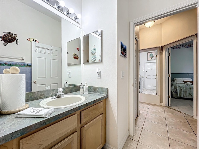 bathroom featuring vanity and tile patterned flooring