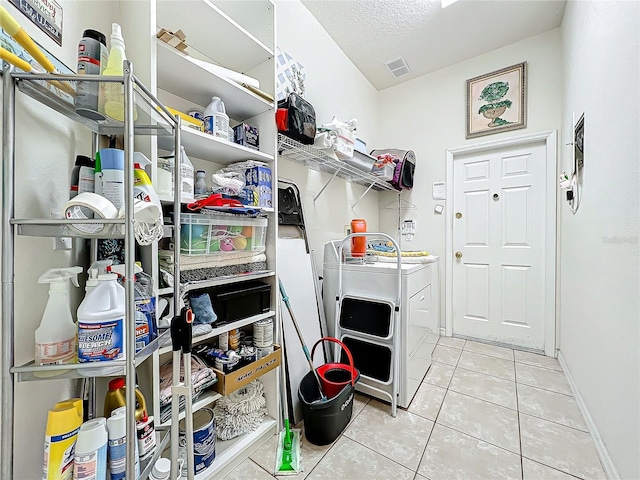 interior space with washing machine and clothes dryer