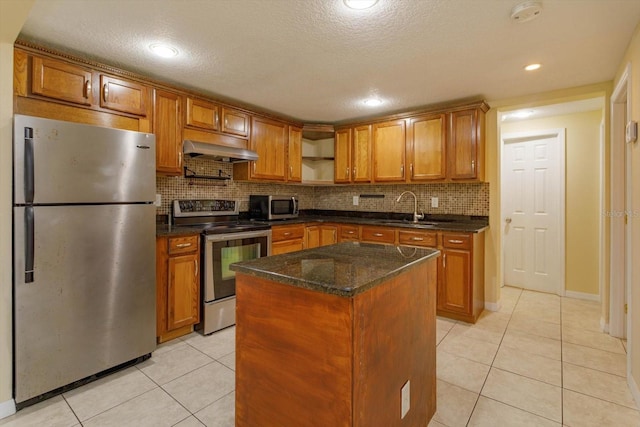 kitchen with exhaust hood, light tile patterned floors, stainless steel appliances, a center island, and sink