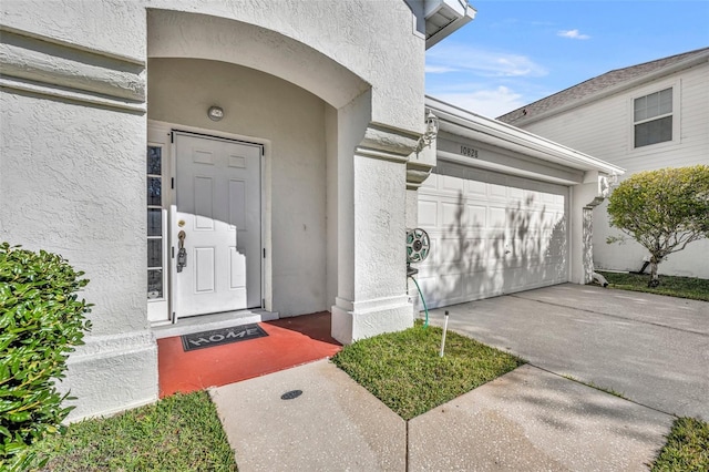 property entrance featuring a garage