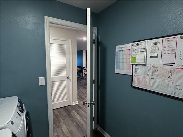 doorway with dark hardwood / wood-style floors