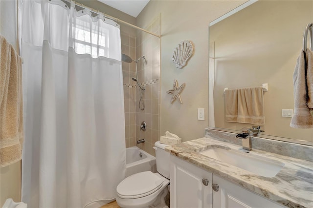 full bathroom with toilet, vanity, and shower / bathtub combination with curtain