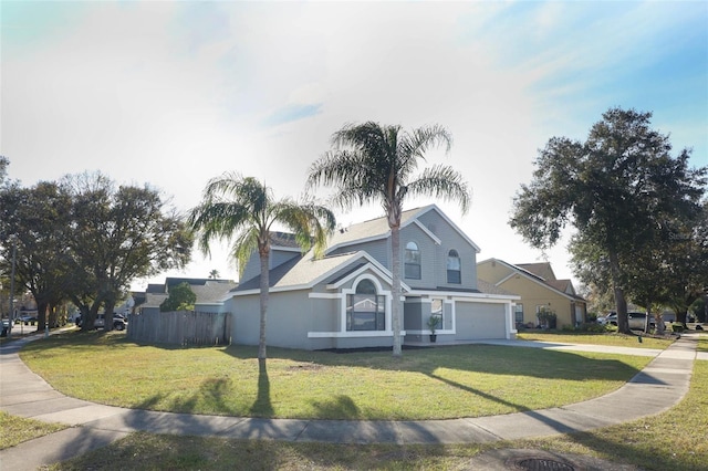 view of side of property featuring a garage and a lawn