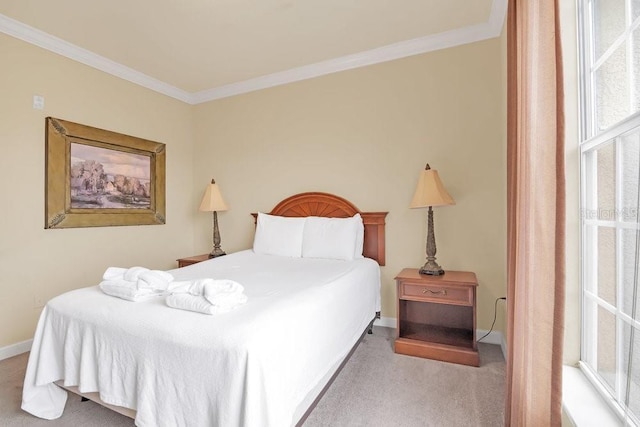 bedroom featuring light colored carpet and ornamental molding