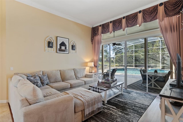 living room with crown molding and wood-type flooring