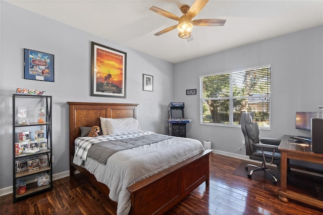 bedroom featuring ceiling fan and dark hardwood / wood-style floors